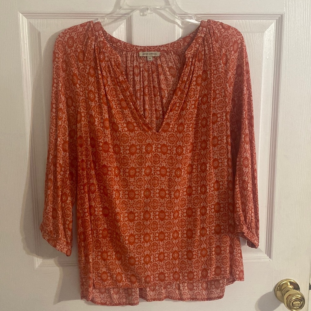 Women’s orange printed top